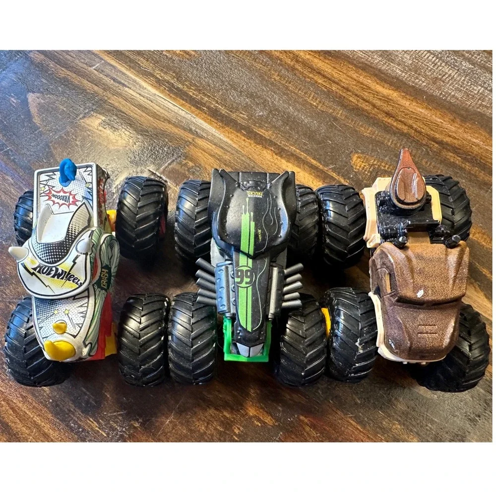 Monster Jam Truck HotWheel Lot of 3 1:64  Rhinomite Jurassic World Radical Racer